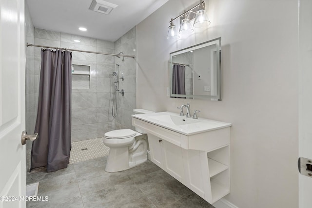 bathroom with toilet, sink, tile patterned flooring, and a shower with shower curtain