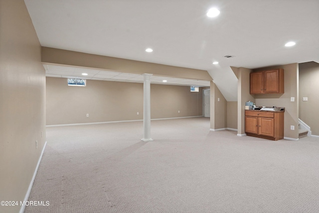 basement with light carpet