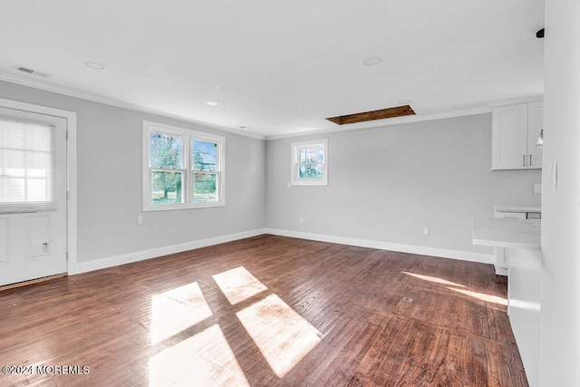 unfurnished living room with dark hardwood / wood-style floors and ornamental molding