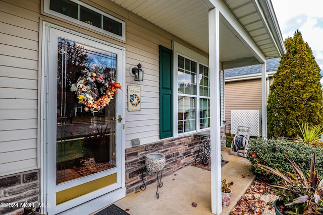 entrance to property with a porch