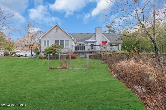 back of house featuring a yard