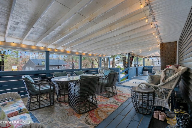 exterior space featuring an outdoor bar and a deck