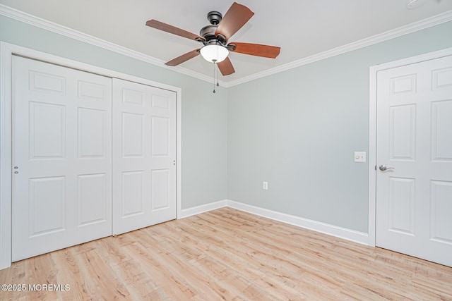 10 Inverell Dr, Toms River, NJ 08757 - unfurnished bedroom with light wood-type flooring, ornamental molding, baseboards, a closet, and ceiling fan