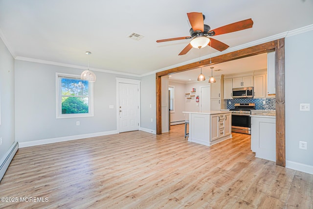 10 Inverell Dr, Toms River, NJ 08757 - kitchen with appliances with stainless steel finishes, a baseboard radiator, a ceiling fan, light wood-type flooring, and light countertops
