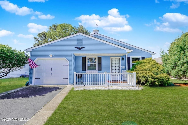 10 Inverell Dr, Toms River, NJ 08757 - view of front of house with covered porch, a front yard, asphalt driveway, and a garage