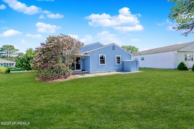 10 Inverell Dr, Toms River, NJ 08757 - back of property featuring a yard and a patio area