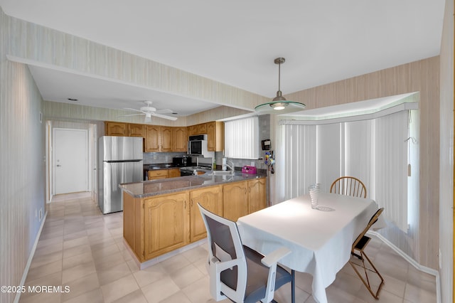 17 Suffolk Way, Marlboro, NJ 07746 - dining area featuring wallpapered walls, baseboards, and a ceiling fan