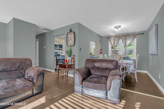 living room featuring dark hardwood / wood-style floors