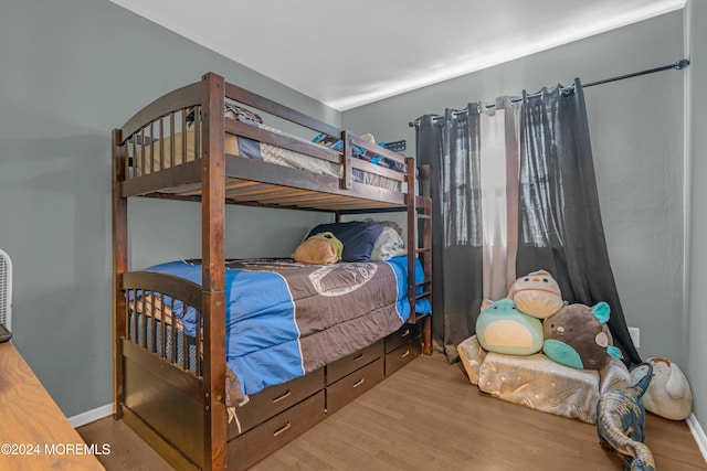 bedroom with light wood-type flooring