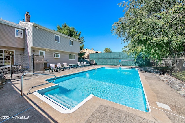 view of pool with a patio