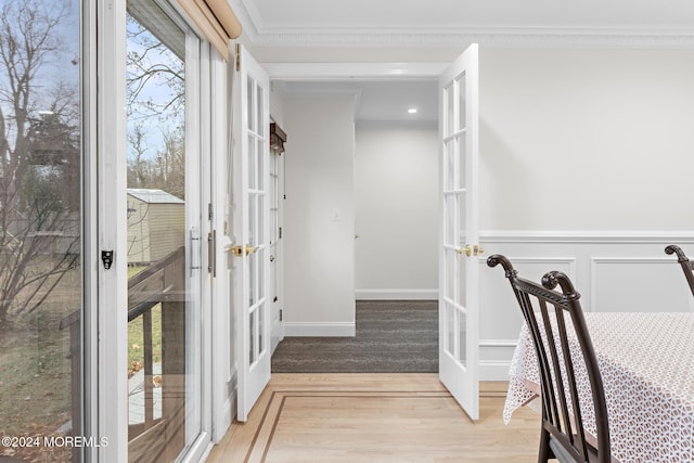 spacious closet with french doors and hardwood / wood-style flooring