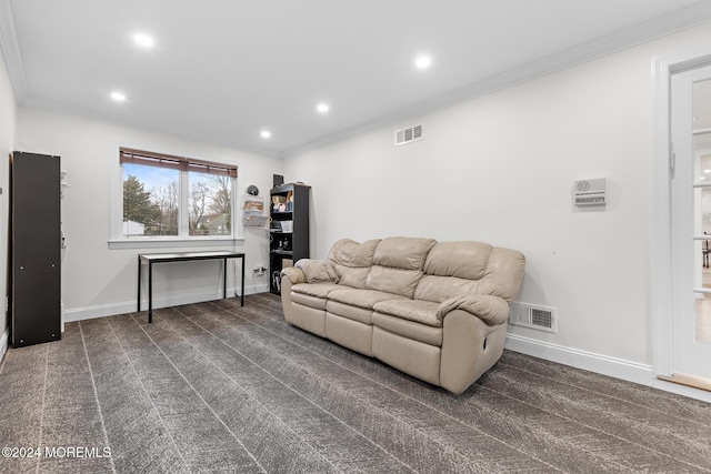 carpeted living room with ornamental molding