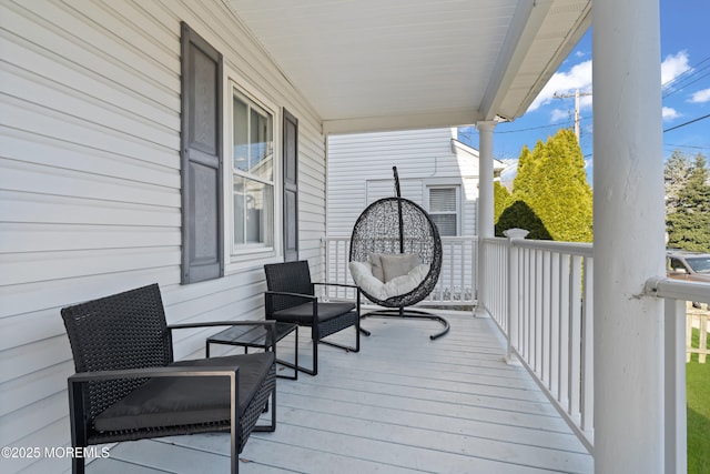 wooden deck with a porch