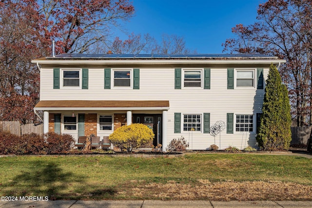 view of front of property featuring a front yard