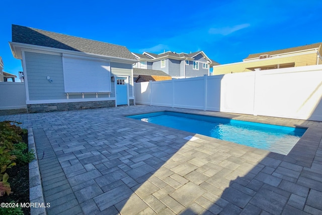 view of pool with a patio area