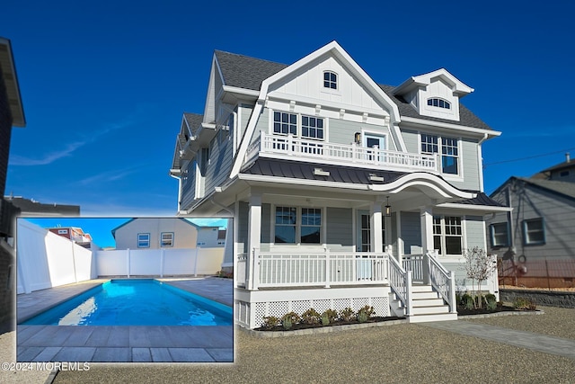 view of front of property featuring a porch and a fenced in pool