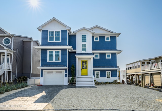 view of front of property featuring a garage