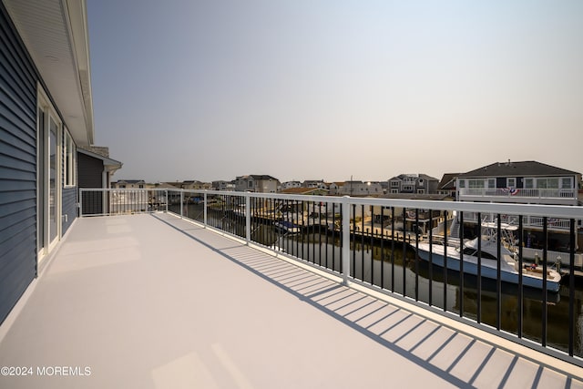 balcony at dusk with a water view