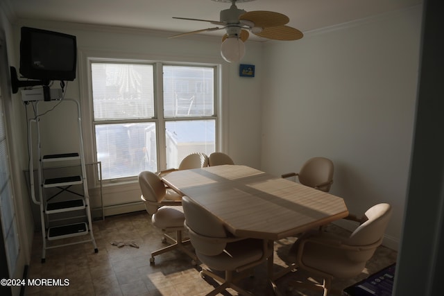 dining room with ceiling fan, ornamental molding, and baseboard heating