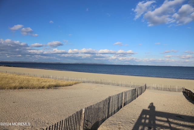 property view of water featuring a view of the beach