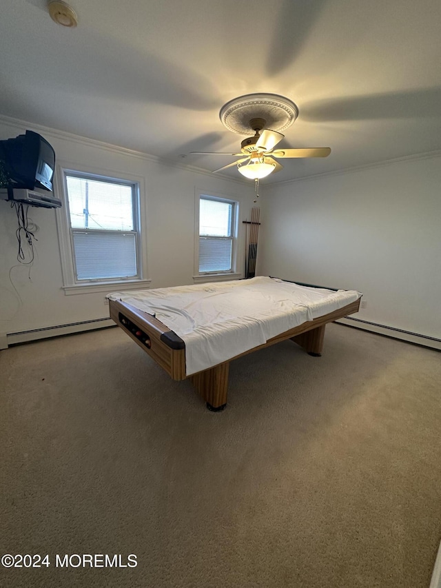 recreation room featuring ceiling fan, a baseboard heating unit, billiards, crown molding, and carpet