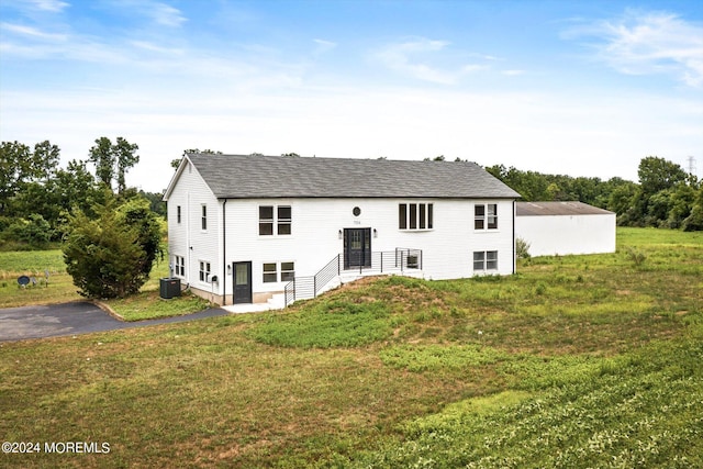 raised ranch featuring central AC unit