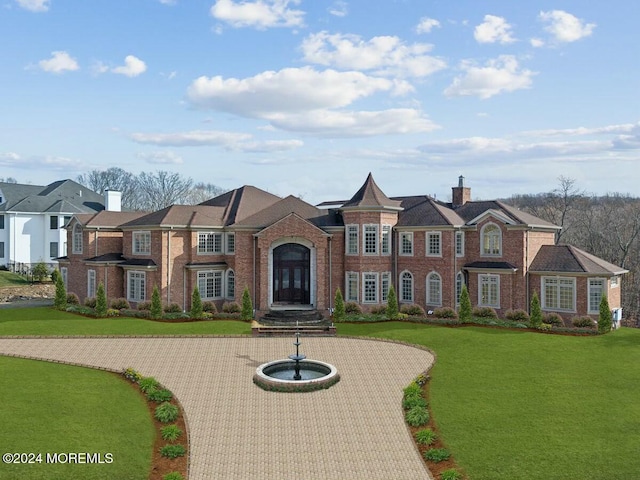 view of front of house with a front lawn