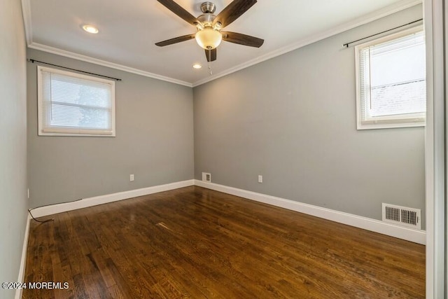 empty room with dark hardwood / wood-style floors, ceiling fan, and crown molding