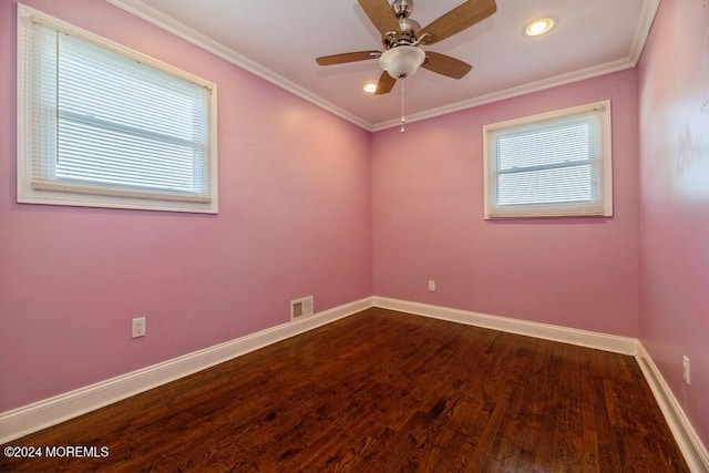 unfurnished room with hardwood / wood-style floors, ceiling fan, crown molding, and a wealth of natural light