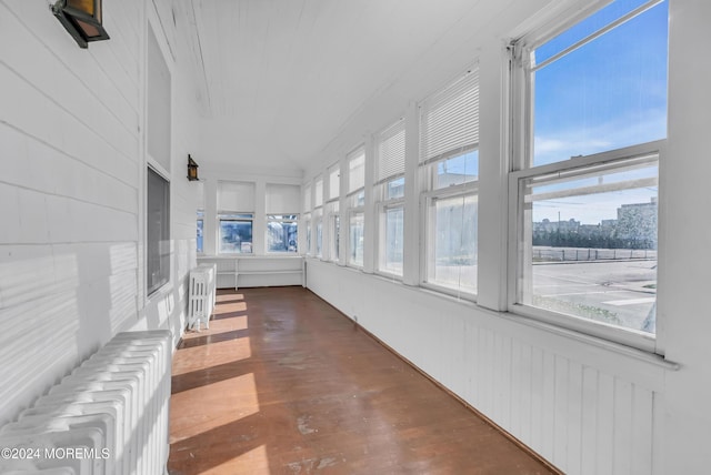 sunroom / solarium featuring radiator