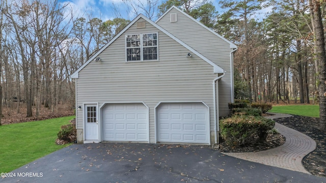 view of property exterior featuring a garage