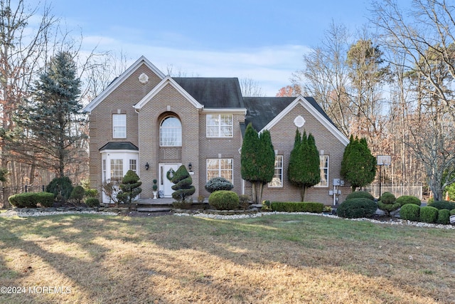 front of property with a front yard