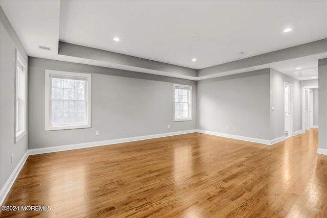 spare room with light hardwood / wood-style flooring