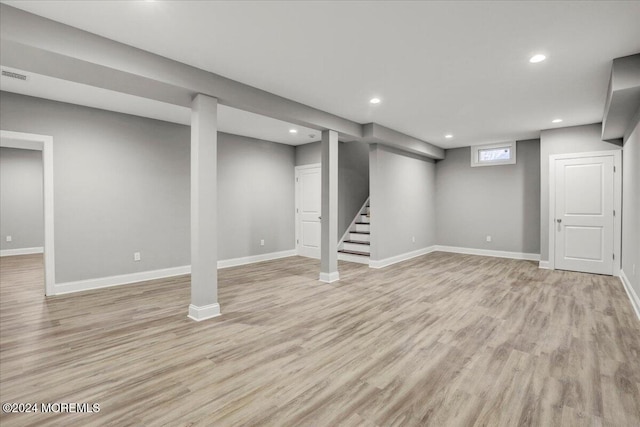 basement with light wood-type flooring