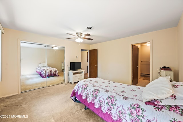 1 Dixon Ct Unit B, Whiting, NJ 08759 - bedroom featuring light carpet, a closet, baseboard heating, ceiling fan, and connected bathroom