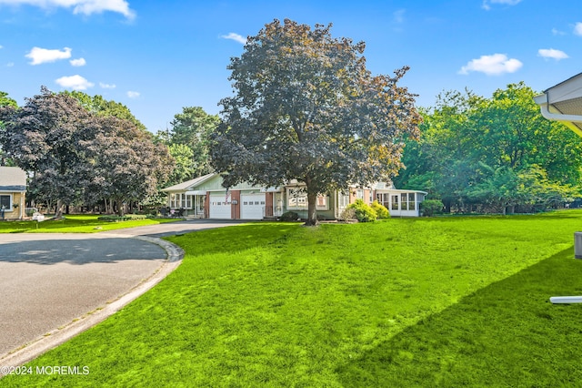 1 Dixon Ct Unit B, Whiting, NJ 08759 - view of front of property with driveway, a front lawn, and a garage