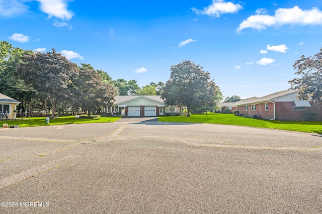 1 Dixon Ct Unit B, Whiting, NJ 08759 - ranch-style home featuring asphalt driveway, a garage, a front yard, and a residential view