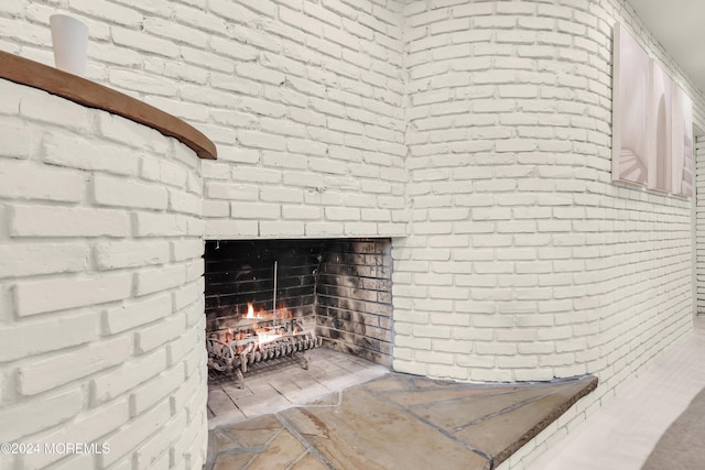 interior details featuring a fireplace