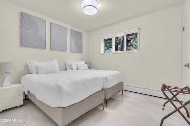 bedroom with a baseboard radiator