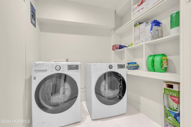 laundry room featuring separate washer and dryer