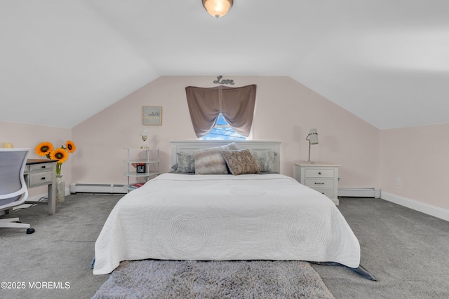 bedroom featuring baseboard heating, vaulted ceiling, and light colored carpet