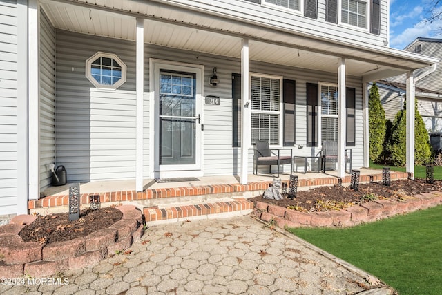 entrance to property with a porch