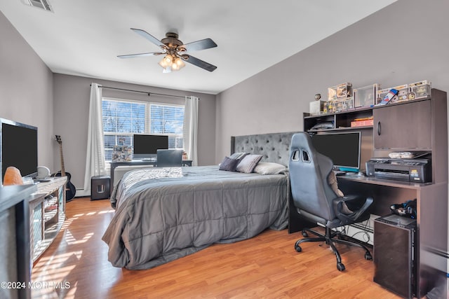 bedroom featuring light wood-type flooring and ceiling fan