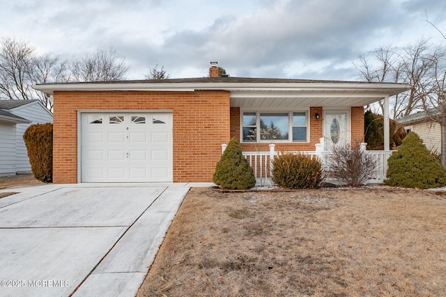 single story home featuring a porch and a garage