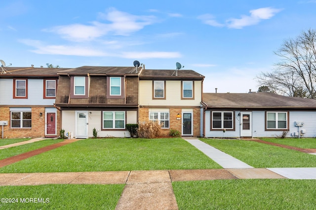 view of front facade with a front lawn