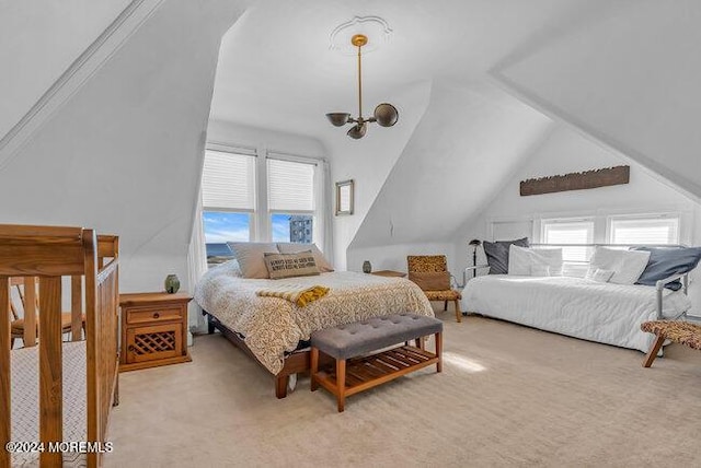 bedroom with multiple windows, light carpet, vaulted ceiling, and an inviting chandelier