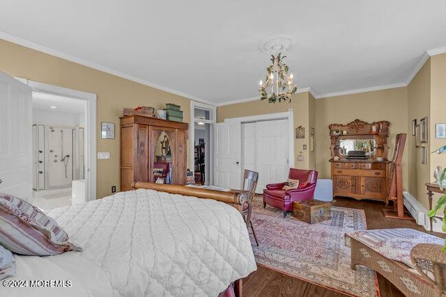 bedroom featuring a closet, crown molding, hardwood / wood-style floors, and an inviting chandelier