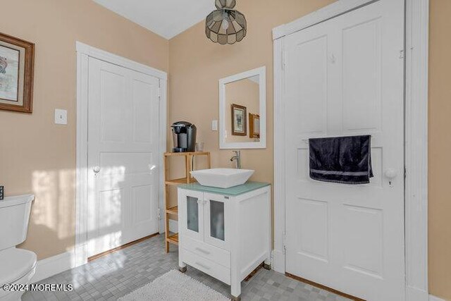 bathroom with sink and toilet