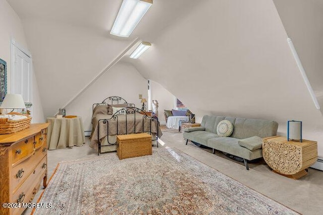 carpeted bedroom featuring vaulted ceiling