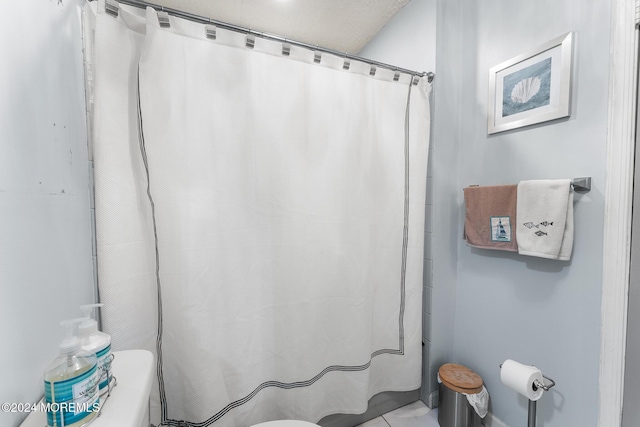 bathroom with a textured ceiling